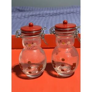 Set of 2 Snowman Glass Canisters with Red Lids. One Missing The Plastic Joint
